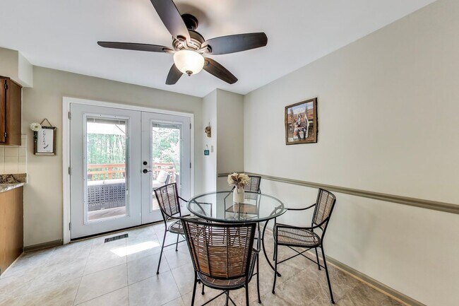Building Photo - COMINGS SOON - Beautifully Updated Winchester-Built Townhome Backing to Serene Parkland.