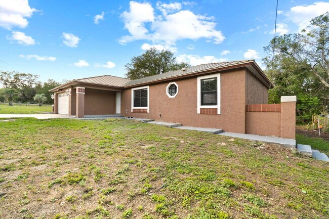 Building Photo - Comfort, Space & Convenience on a Peaceful Corner Lot in the Shores