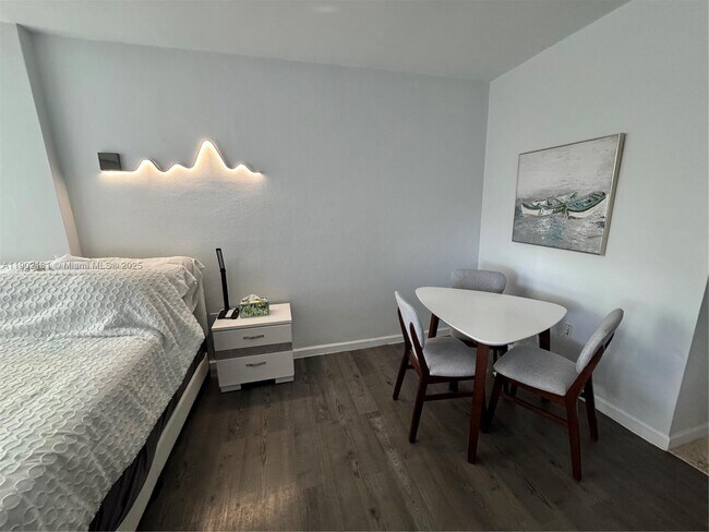 Building Photo - 10275 Collins Ave