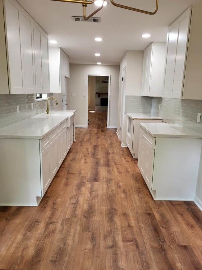 Custom Kitchen with Quartz Countertops (Black stainless steel appliances arrving soon) - 212 Scotchpine Dr
