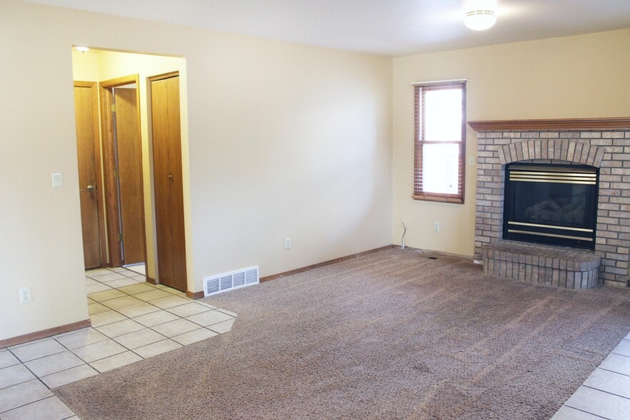 Family Room with Gas Fireplace - 1025 Centennial Dr