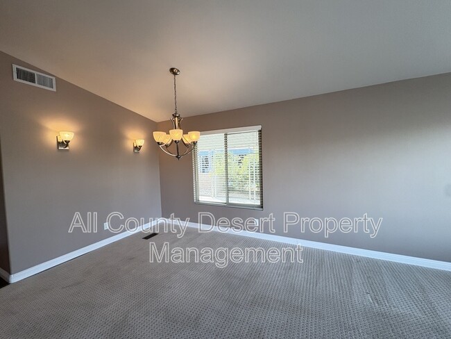 Building Photo - 38251 Desert Greens Dr E