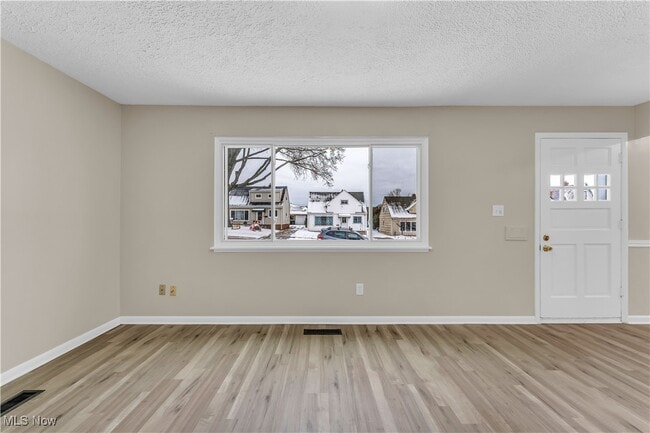 Building Photo - 7611 Newport Ave