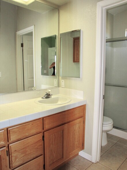 master bath with dual vanity and walk in shower - 2306 Francisco Ave