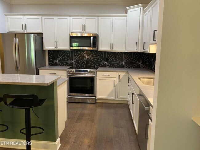 Building Photo - Live in Style, Relax in Comfort, and Love ...