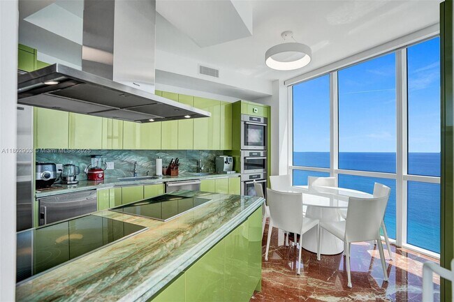 Building Photo - 18201 Collins Ave