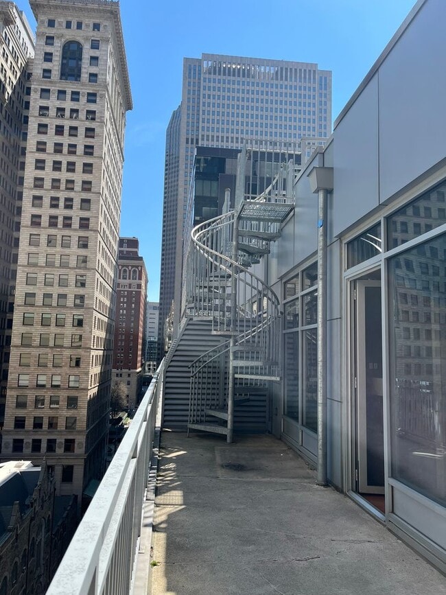 Building Photo - Luxury Penthouse Condo Downtown with Private Patio & Amazing Views Available Now!