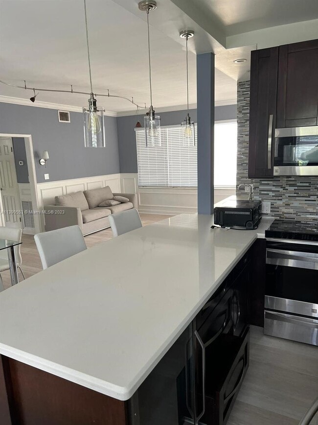 Building Photo - 9910 Collins Ave