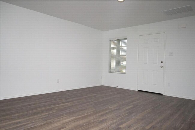 Building Photo - 5701 Manarchos Ln