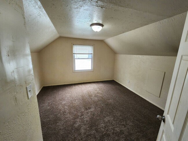 Building Photo - Move-In Special: Save $300 on This Charmin...