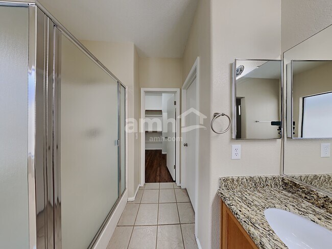 Building Photo - 8746 W Cherry Hills Dr