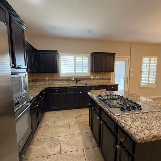 Building Photo - 4 Bedrooms, 3 Baths, a Pool, and Solar Panels!