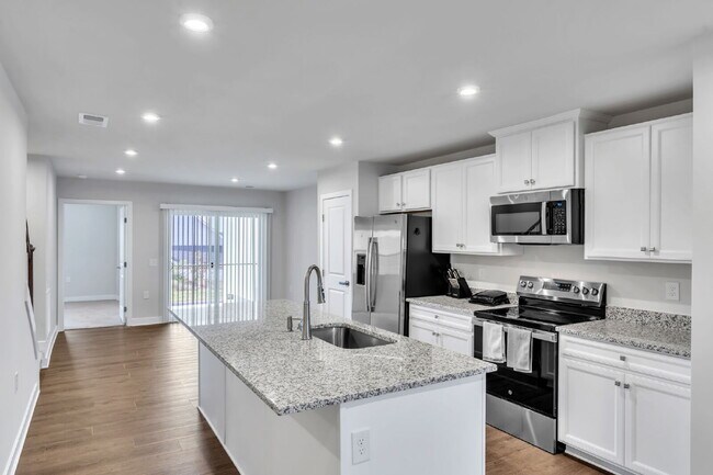 Building Photo - Modern Comfort: 3 Bed, 2.5 Bath Townhome + Primary on Main $1,875/mo rent