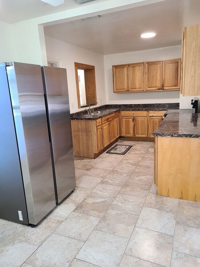 Building Photo - Stunning Corner-Lot Rental: 4BR/2BA with Courtyard