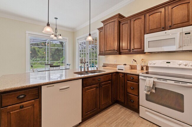 Building Photo - Beautiful 3/3 Pool Home in Gated Community W/ Lake Access