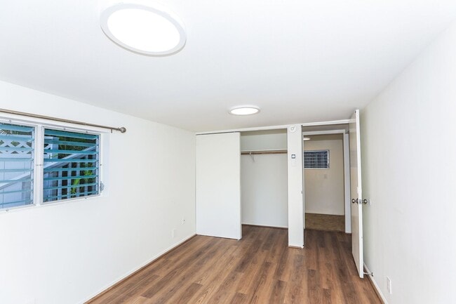 Building Photo - Kahala Avenue Beachside - remodeled 2 bedroom, 1 bath with Luxury Vinyl Plank Flooring