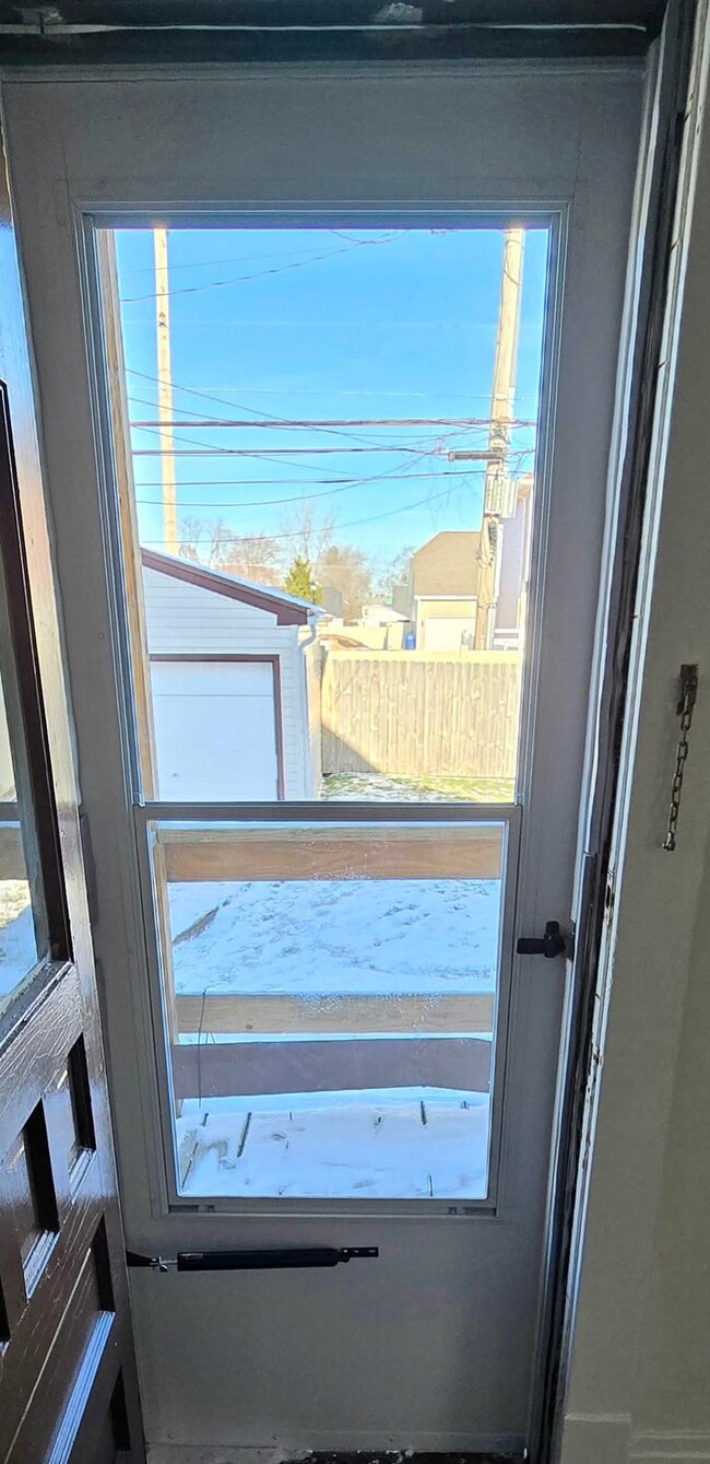 Back bedroom 1 storm door - 414 Taunton Pl