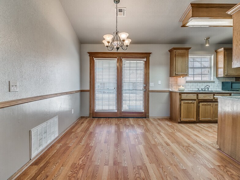 Dining Room with french doors to access backyard and patio - 1821 Overland Trail