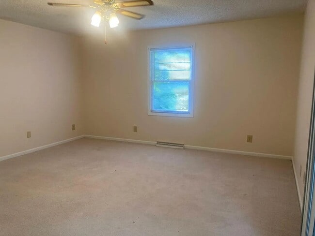 Building Photo - Beautiful Duplex Located in Serene, Wooded...