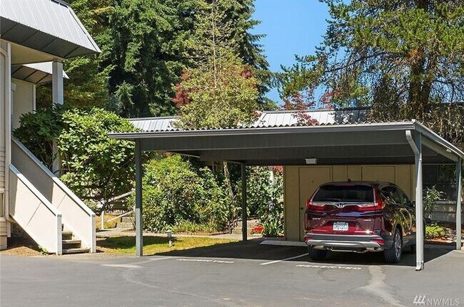 Covered parking with plenty of guest parking - 1605 102nd Pl NE