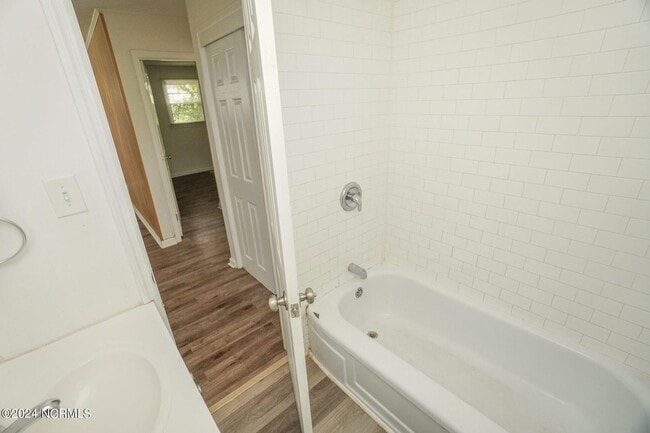 Building Photo - Lawn Care Included in Jville City Limits!