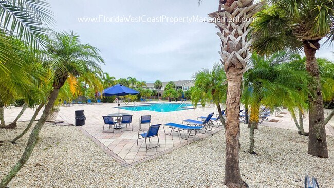 Building Photo - MOVE IN READY! LARGE 2 BEDROOM/2 BATH PLUS ATTACHED GARAGE! TILE/LVP THROUGHOUT!
