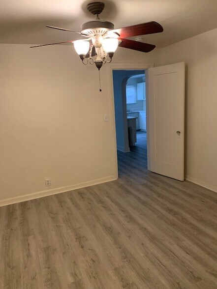 View from the master bedroom to the living room/dining room/kitchen. - 24606 University Ave