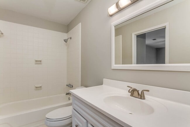 Building Photo - Three bedroom two bath