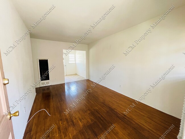 Unit 5 Living Room - 11682 Darlington Ave