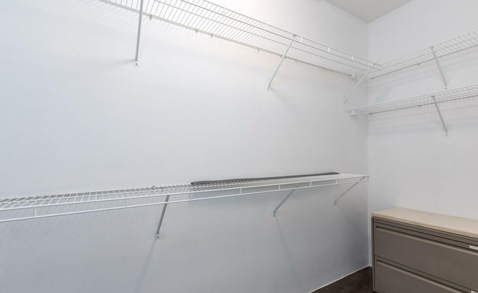 walkin closet off bedroom - 400 E Main St