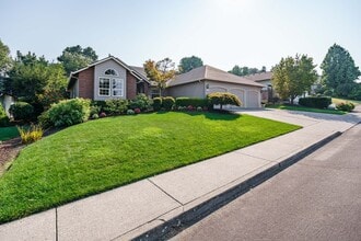 Building Photo - Beautifully Landscaped 1/4 acre with Well Maintained 4 bedroom 2 Bath Home with 3 Car Garage