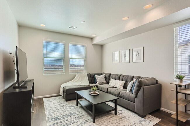 Building Photo - Modern Comfort Minutes from DIA — 3BR Town...