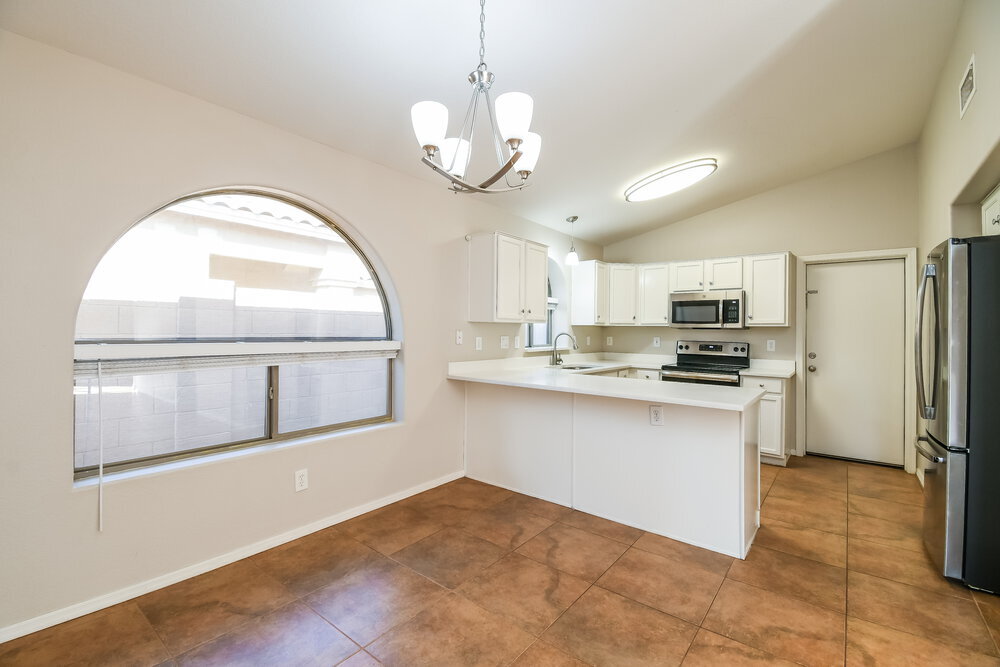 Building Photo - 9909 E Onza Ave