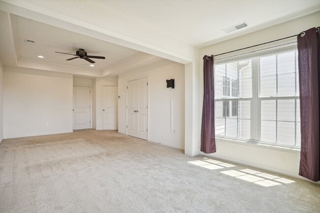 Building Photo - This beautiful townhome spans three finished levels and over 2800 square feet.