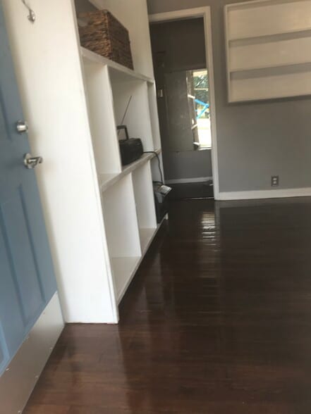 View from front door past the entertainment center into the central hall - 1407 W Church St