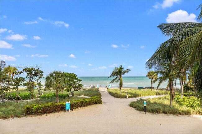 Building Photo - 9801 Collins Ave