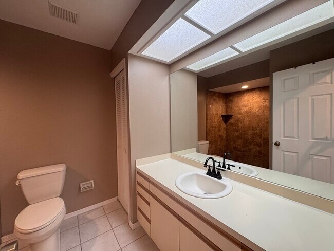 Building Photo - Coastal Luxury Awaits – 3-Story Townhome i...