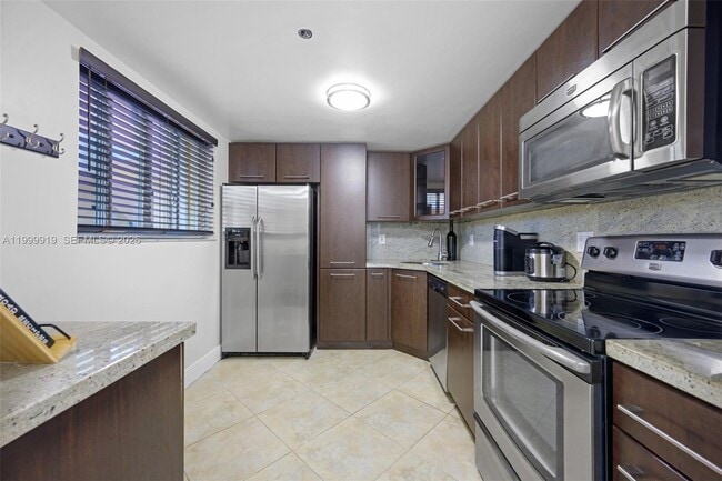 Building Photo - 8888 Collins Ave