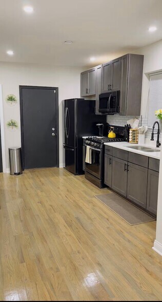 Building Photo - 1954 E 73rd Pl