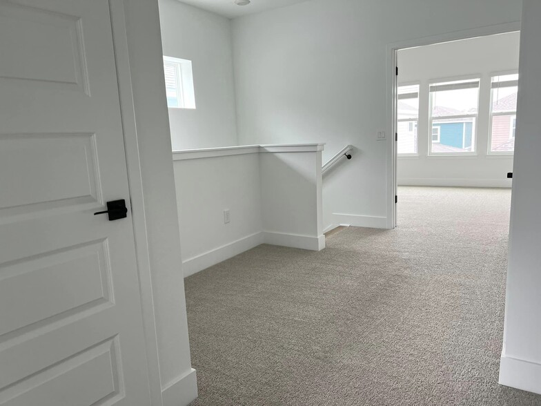 2nd floor landing sitting area. - 14990 Lebeau Loop