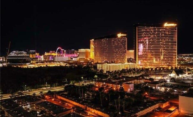 Building Photo - Move-In Ready, Fully Furnished Condo – Prime Strip Location