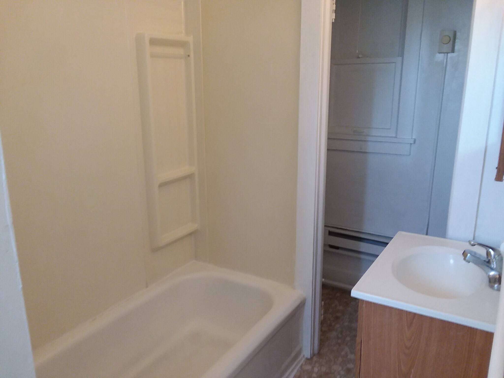 Full Bathroom with its own storage space - 221 Bridge St