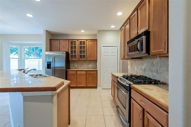 Building Photo - Spacious 3/2 with enclosed office and fence enclosed yard!