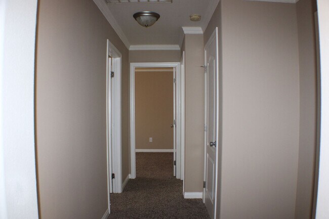 Building Photo - Charming 3-Bedroom Home with Fireplace, Spacious Backyard & Attached Garage in California City!