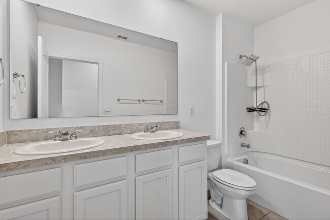 Building Photo - Available Now! 4BR Home in Avalon Park with Fenced Yard & Resort-Style Amenities