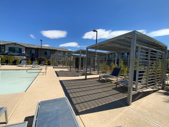 Building Photo - GATED 3 BED 3 BATH 2 CAR GARAGE TOWNHOUSE w/ LOFT + ROOM DOWNSTAIRS & COMMUNITY POOL IN HENDERSON