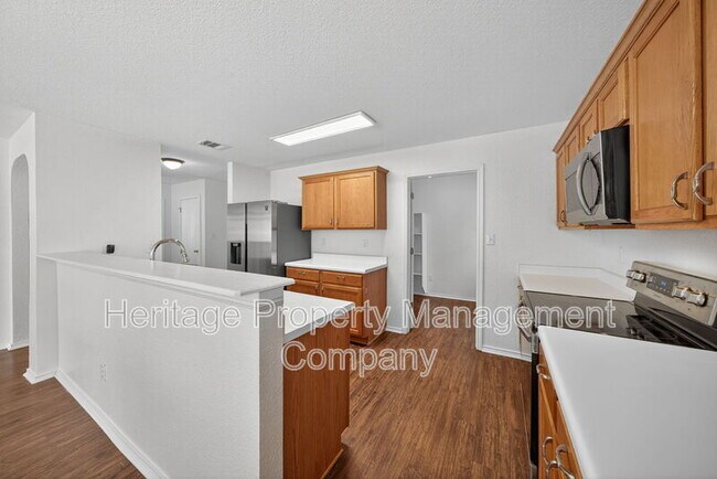 Building Photo - 4935 Dahlia Terrace