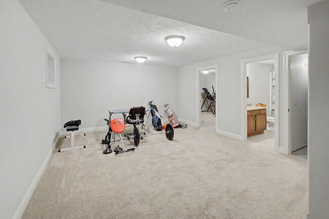 Building Photo - Spacious 4-Bedroom, 3.5-Bathroom Townhome & 2-Car Garage-West Champaign