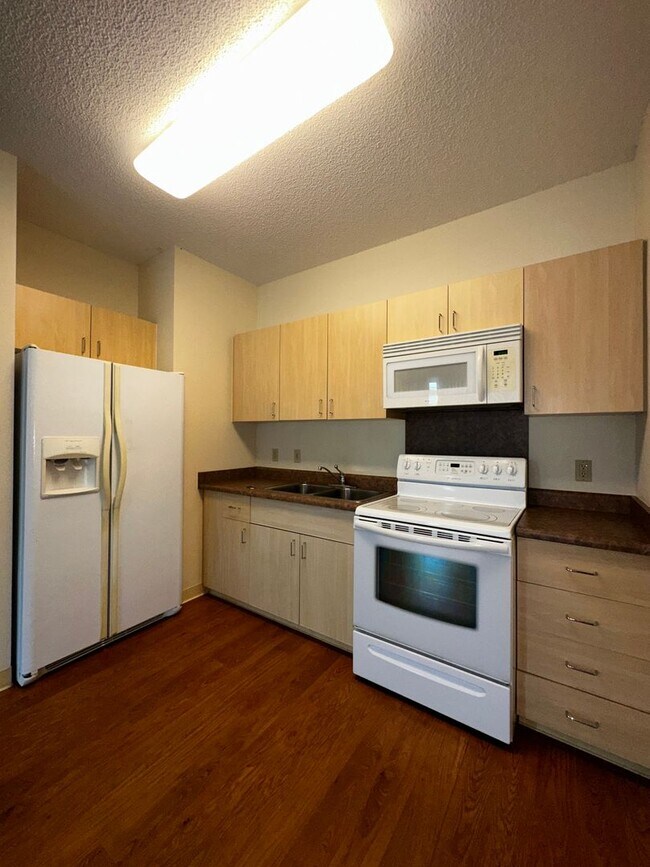 Building Photo - Plantation Town Apartments - Paiwa Tower 1...