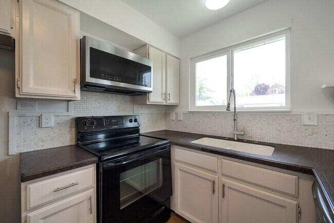 Building Photo - Updated Provo Home w yard + attached 2 car!
